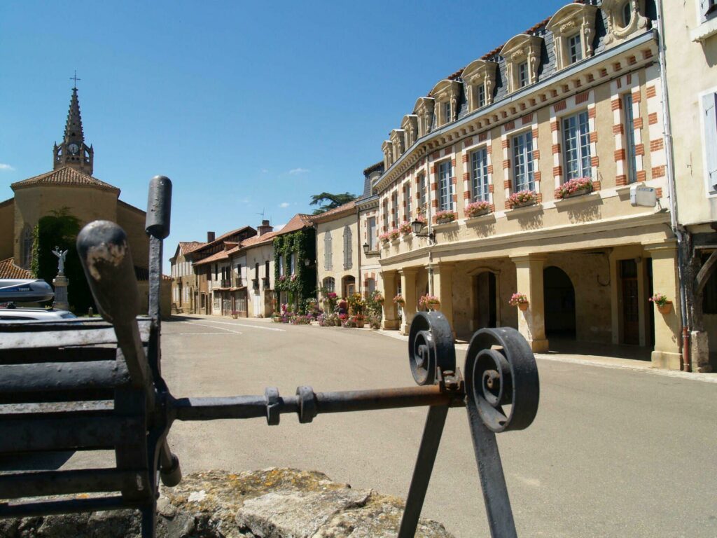 Beautiful view of the main street in the French village of Lupiac in Gascony, France