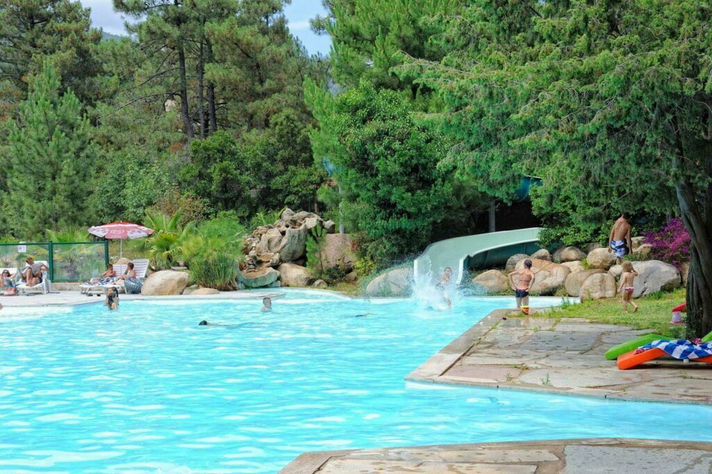 Pool with water park at U Mulinacciu campsite at campsites in Corsica