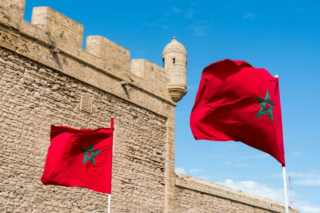 Morocco flag with a fortress in the background