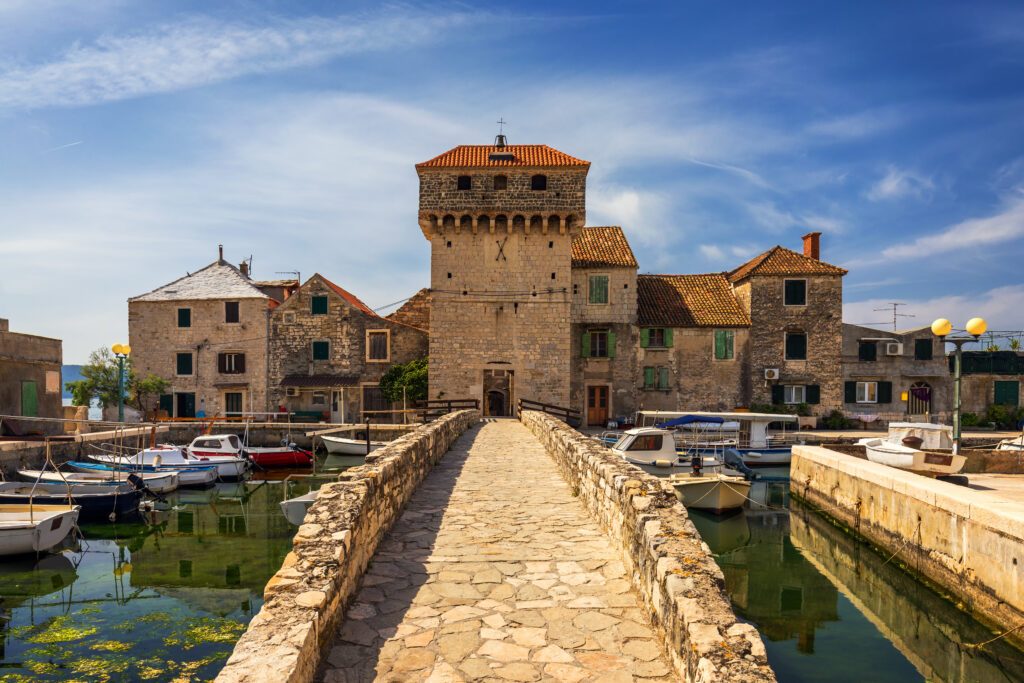 Kastel Gomilica one of seven settlement of town Kastela in Croatia was one of the locations in series Game of Thrones. Historic Kastel Gomilica architecture view near Split, Croatia.