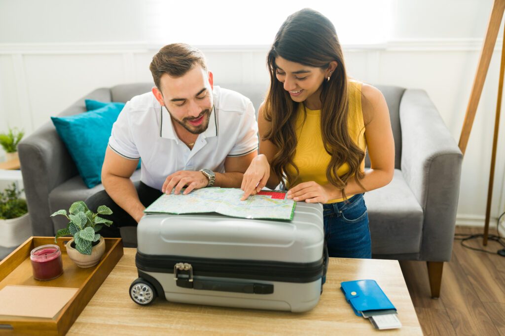 Attractive couple planning their vacations