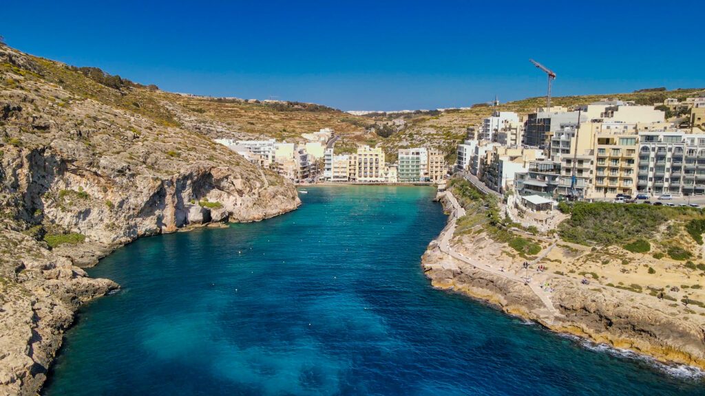 Aerial view of beautiful Xlendi Bay from drone, Gozo