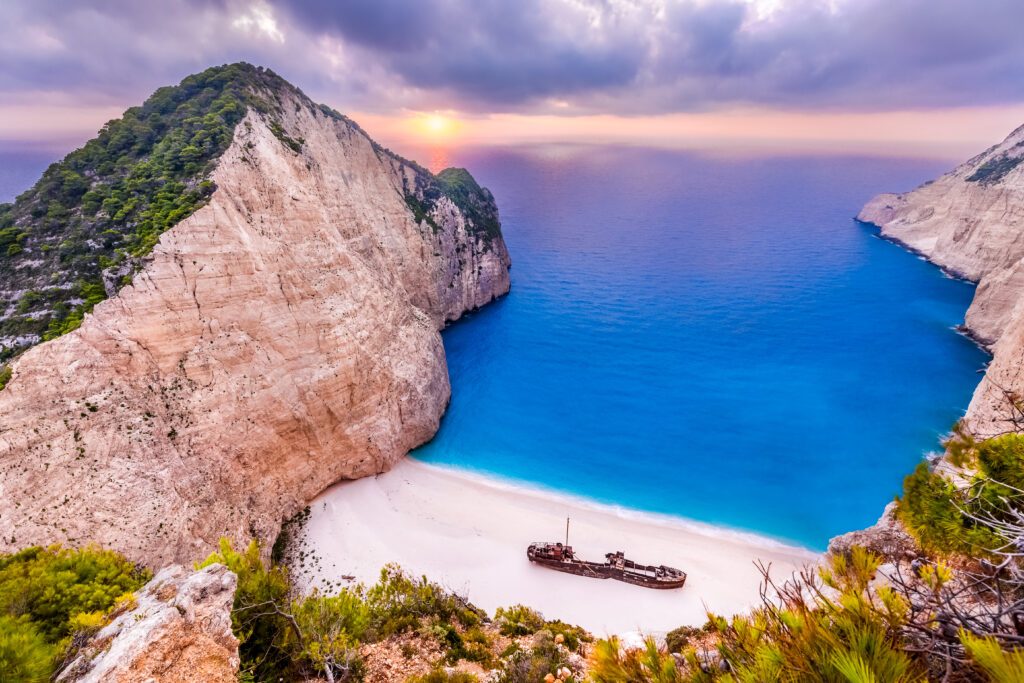 Navagio beach with shipwreck at sunset,Zakynthos island, Greece