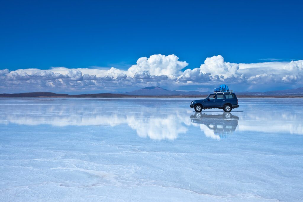 Reflection of car in Salar de Uyuni(Uyuni Salt Flat), Bolivia