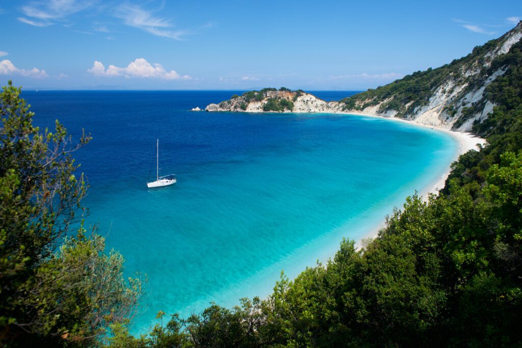 Sailboat on the beach Light blue water on Gidaki on the Ithaca (Ithaki or Ithaka) island like paradise with blue sky in Greece Europe