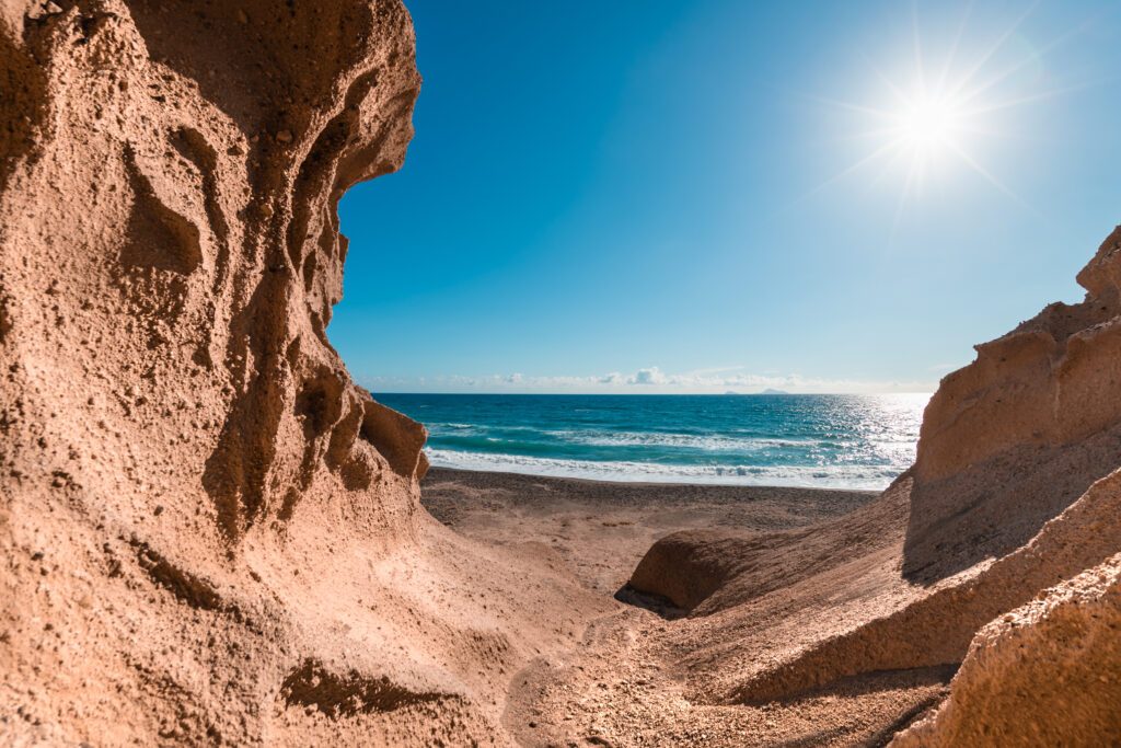 Volcanic cliffs on Vlichada beach, Santorini island, Greece.