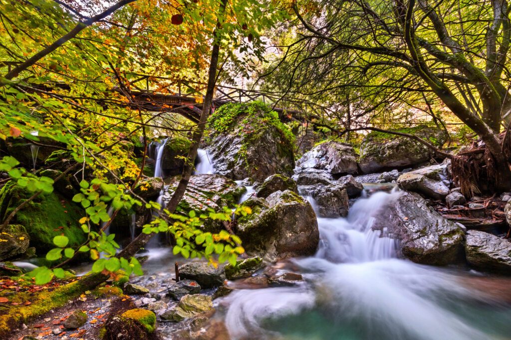 Enipeas river and a wooden bridge, close to Prionia, Olympus mountain Pieria, Central Macedonia, Greece.