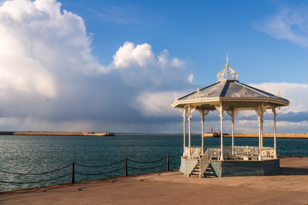 The Dun Laoghaire bandstand landmark located on the East pier of the harbour in Dublin, Ireland. Victorian cast iron filigree bandstand.