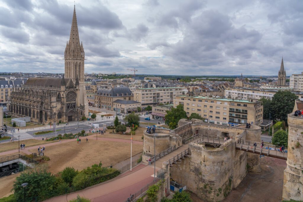 Caen, France - 08 14 2019: Castle of Caen. View of St. Peter's Church from the castle