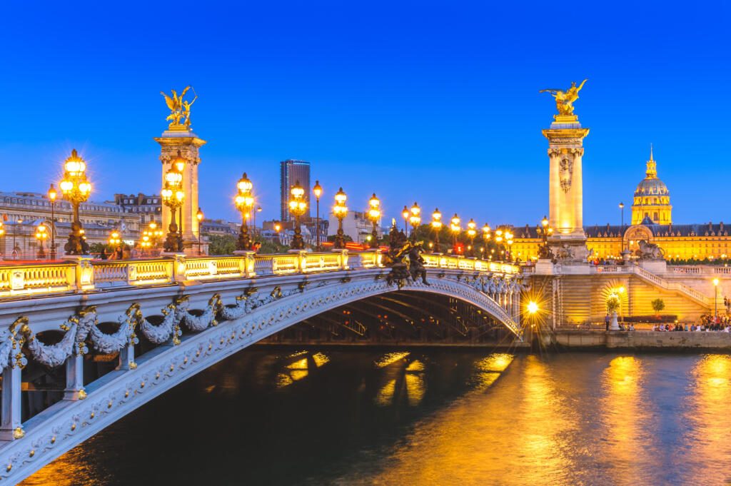 night view of Alexandre 3 Bridge in paris, france