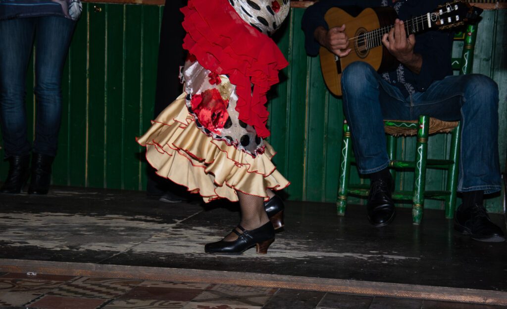 flamenco dancer on traditional wooden table
