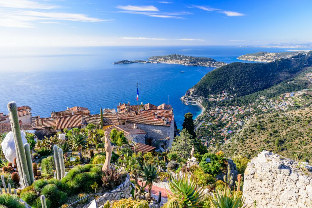 Scenic view of the Mediterranean coastline and medieval houses from the top of the town of Eze village on the French Riviera