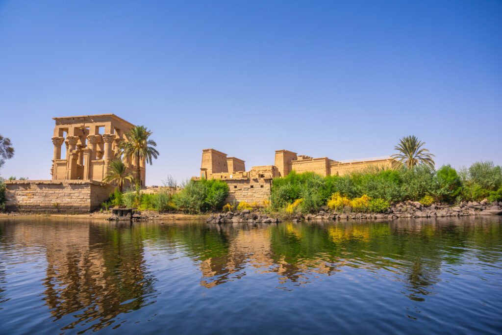 The beautiful temple of Philae and the Greco-Roman buildings seen from the Nile river, a temple dedicated to Isis, goddess of love. Aswan. Egyptian
