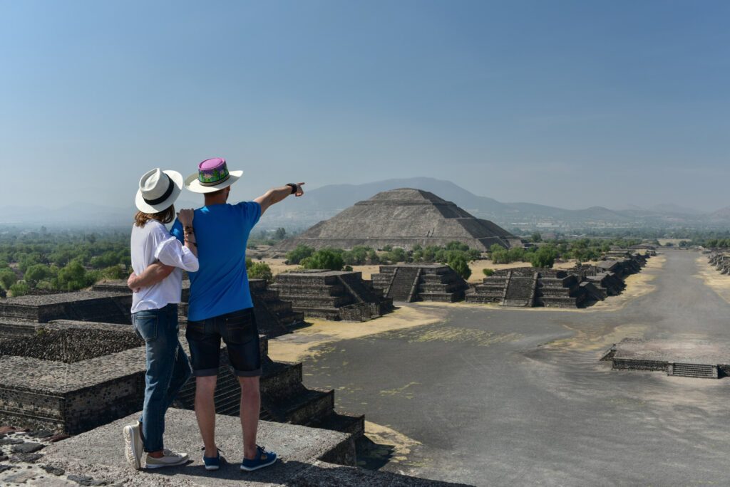 Couple overlooking Pyramid of Sun in Teotihuacan