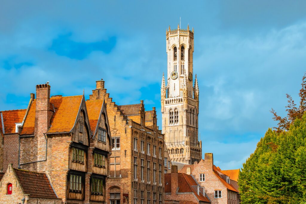 Bruges, Belgium. Historical houses and Belfry tower.