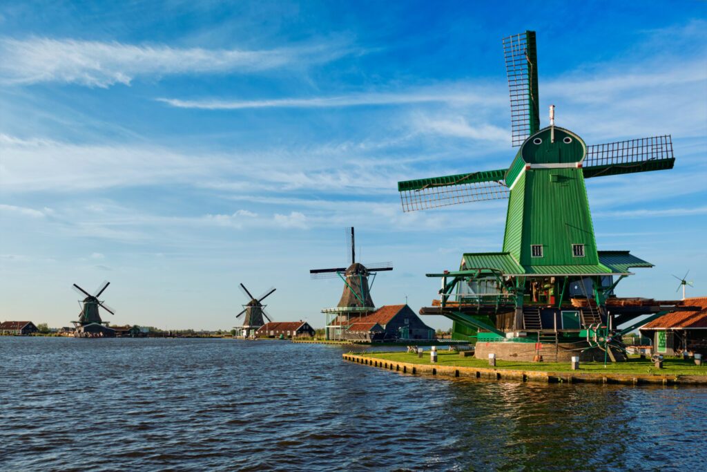 Windmills at Zaanse Schans in Holland on sunset. Zaandam, Nether