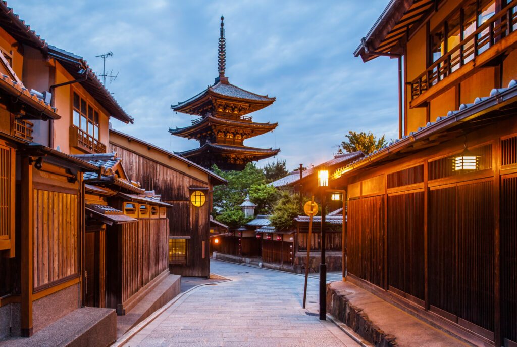 Japanese pagoda and old house in Kyoto at twilight