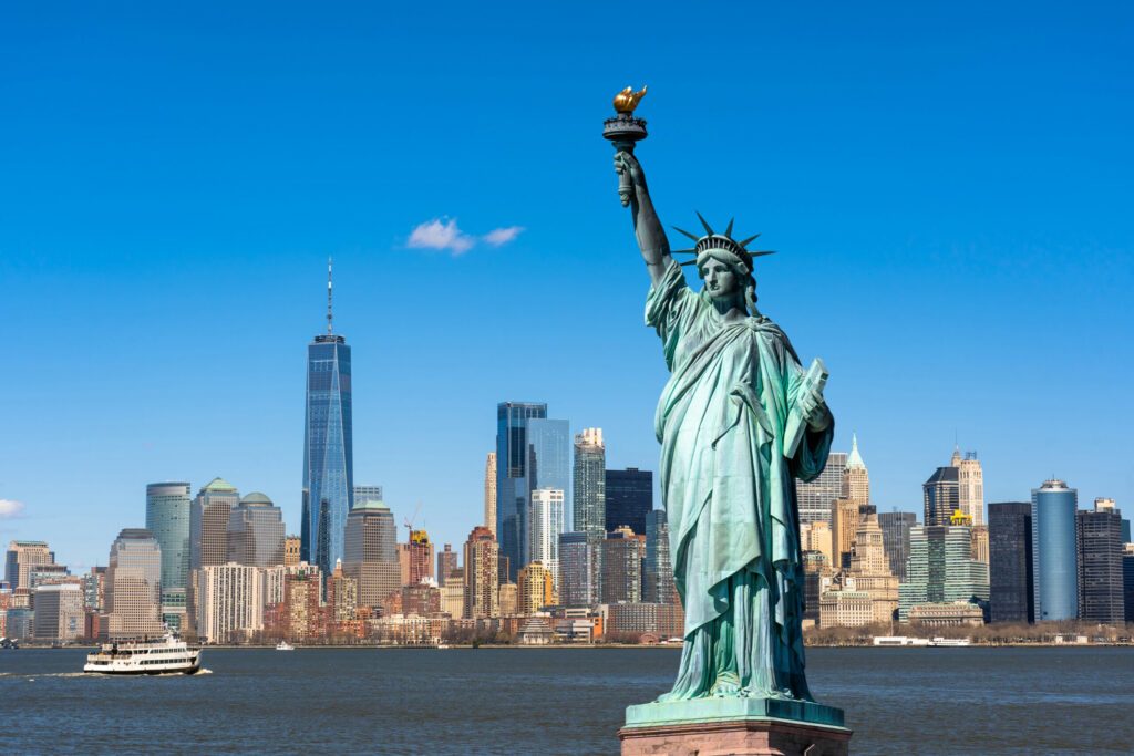 The Statue of Liberty over the Scene of New york cityscape river side which location is lower manhattan,Architecture and building with tourist concept