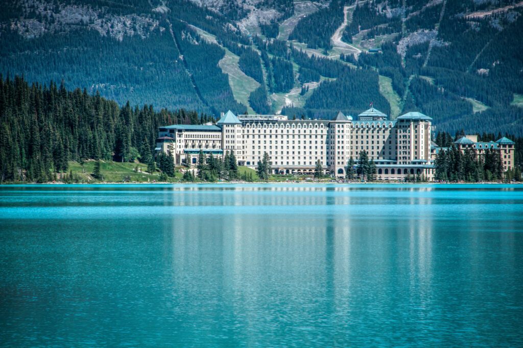 fairmont chateau and a canoe at lake louise in banff national park