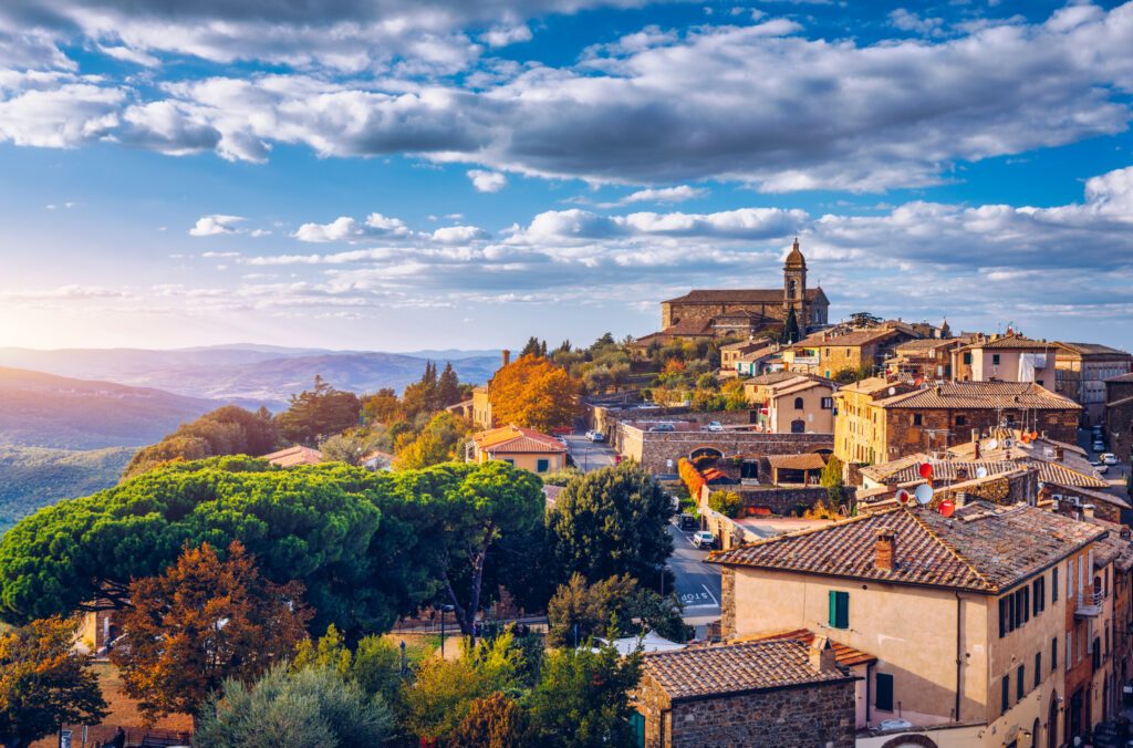 View of Montalcino town, Tuscany, Italy. Montalcino town takes its name from a variety of oak tree that once covered the terrain. View of the medieval Italian town of Montalcino. Tuscany