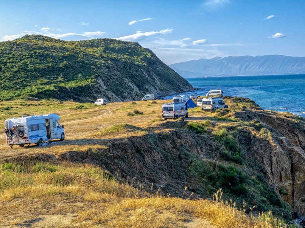 Caravans scattered on a cliff on the Adriatic Sea. Albania