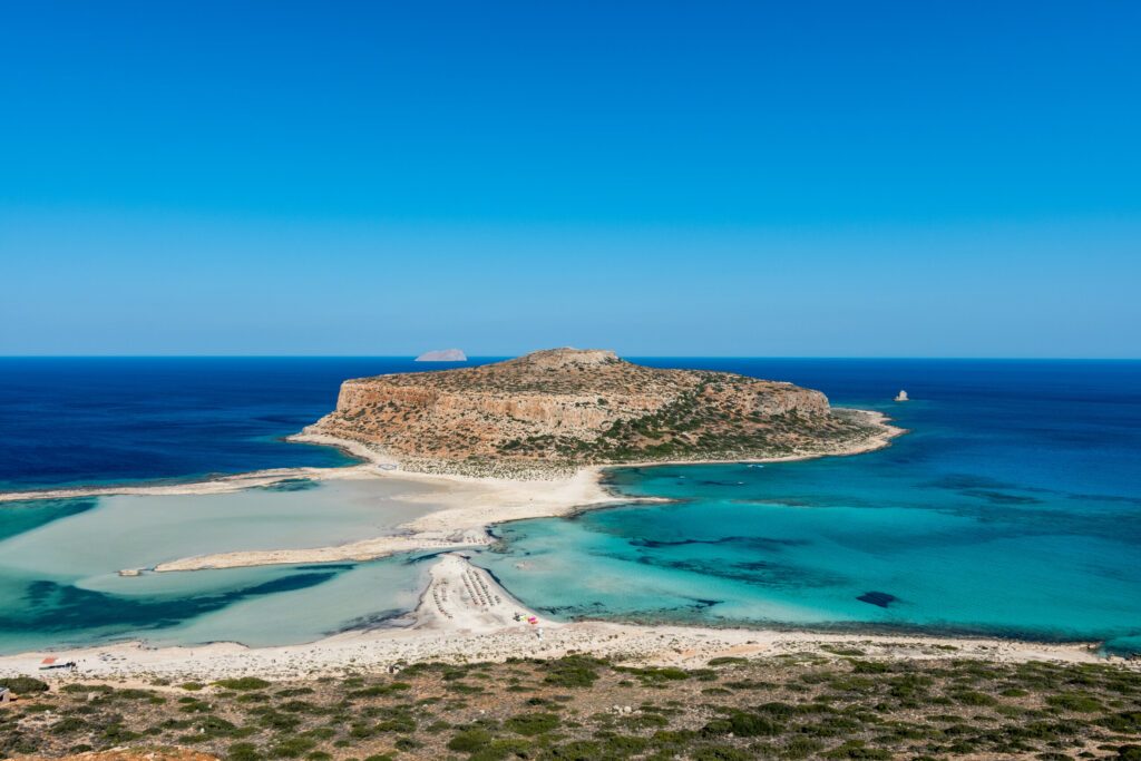 Blue lagoon in Balos, Crete, Greece. Beautiful lagoon at Mediterranean Sea. Balos Bay capture on the top of the mountain. View from above on a Gramvousa Island.