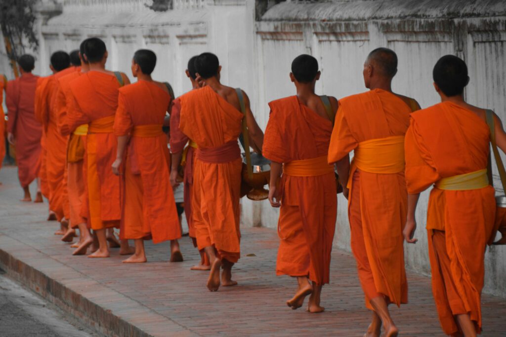 buddhist monks walk Tak Bat in luang prabang