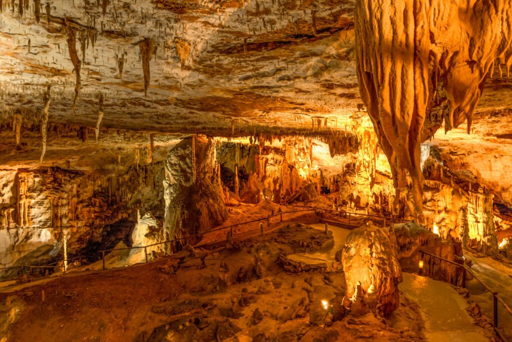 Cave from the Jurassic period with stalactites and stalagmites, located near the town of Molain in France.