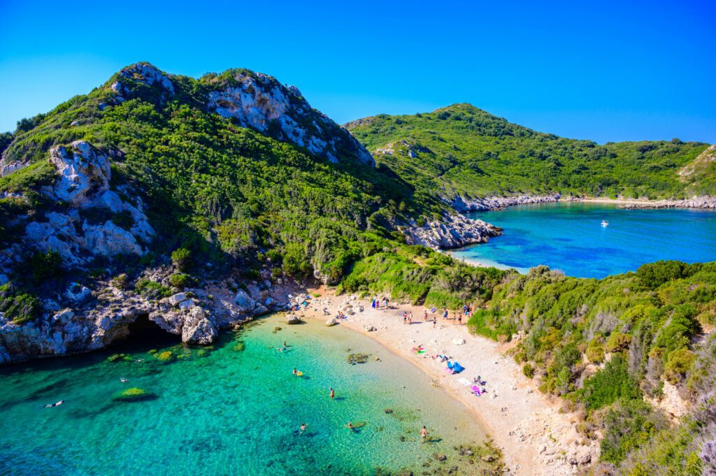 Porto Timoni beach at Afionas is a paradise double beach with crystal clear azure water in Corfu, Ionian island, Greece, Europe