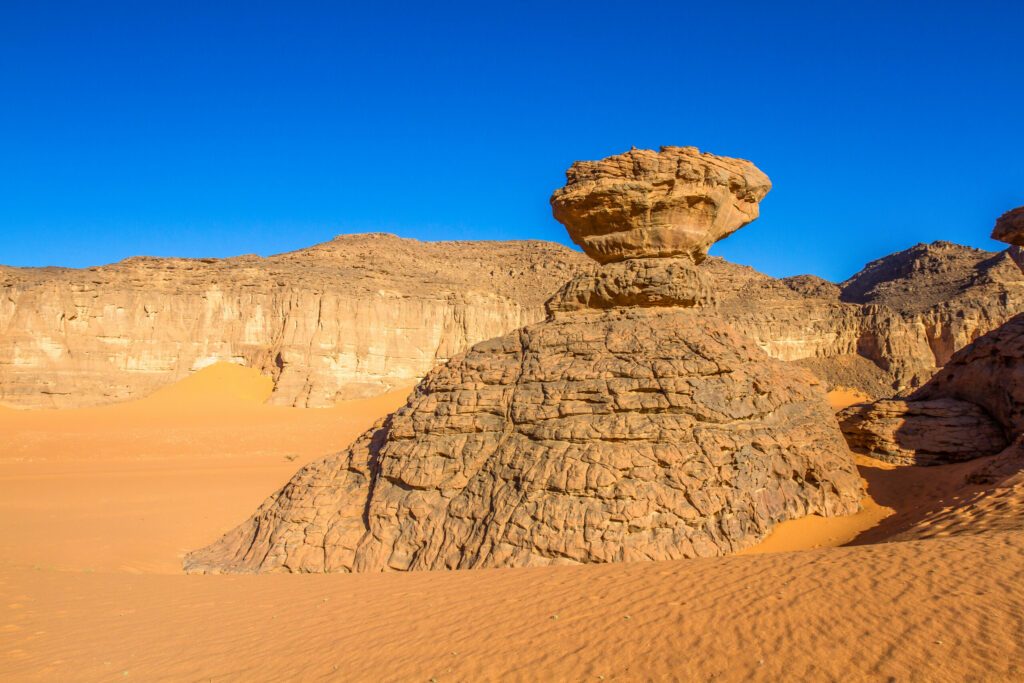 Sahara’s landscape.  Amazing rock formation  in  Tadrart Rouge. Sahara desert. Tassili n’Ajjer National Park,   Algeria