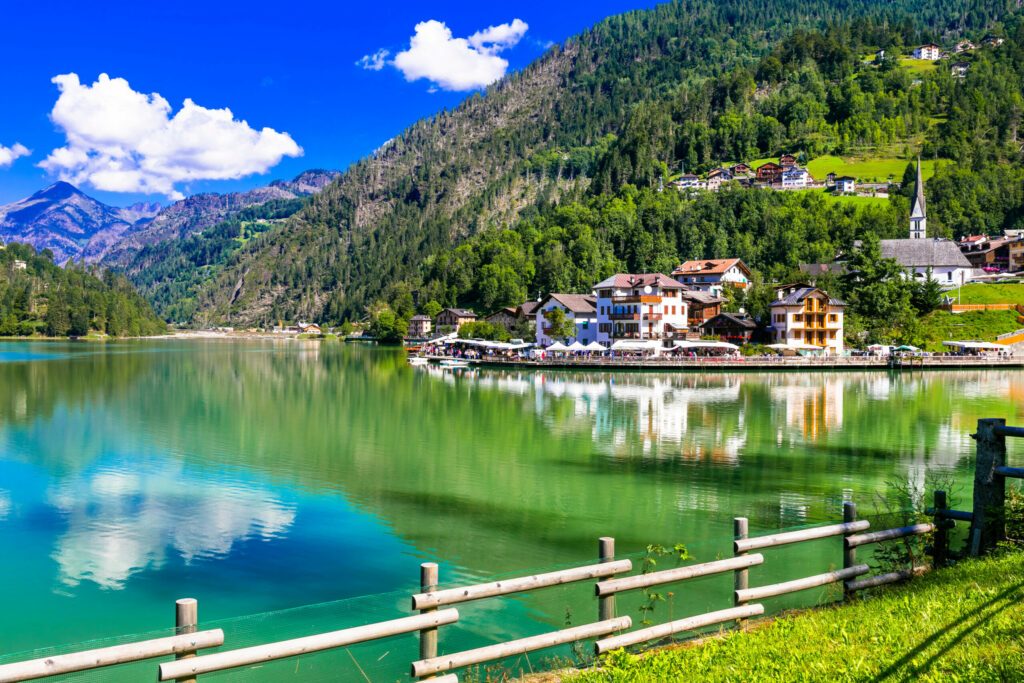 Amazing alpine scenery, Dolomites mountains. Beautiful lake lago di Alleghe, northern Italy (Belluno province)