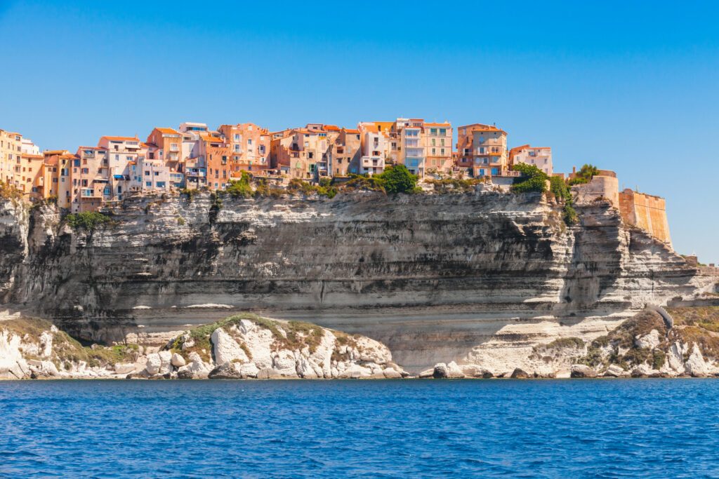 Colorful living houses on rocky coast, Bonifacio