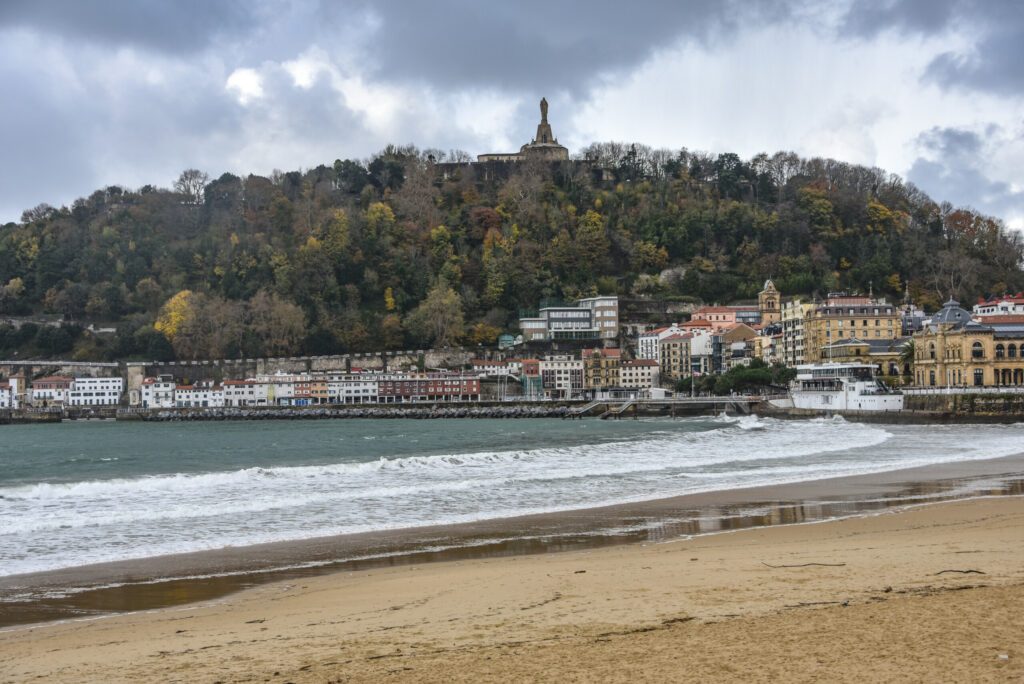 San Sebastian, Spain - 28 Nov, 2021: Autumn colours over La Concha Bay and Mount Urgull on the Basque coast
