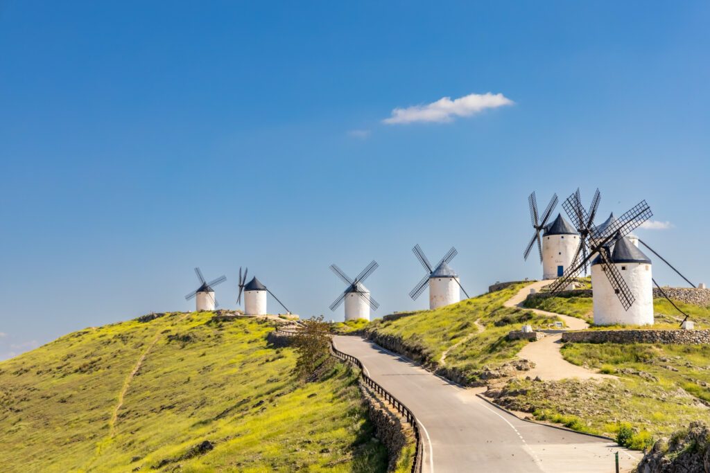 landscape mill spain clouds and castle La Mancha Consuegra with blue sky with clouds