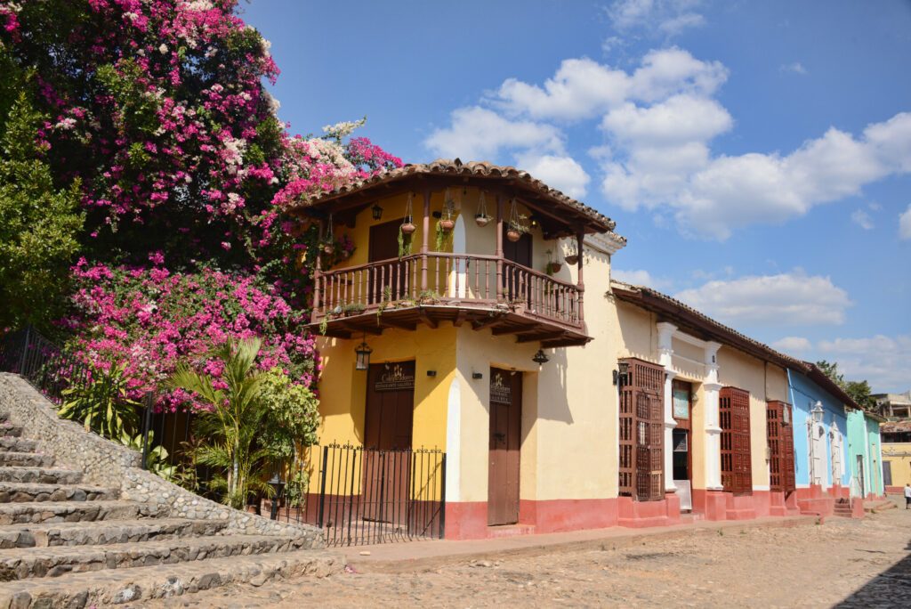 Colonial architecture,  blooming flowers, and the street scenes from UNESCO World Heritage Trinidad, Cuba