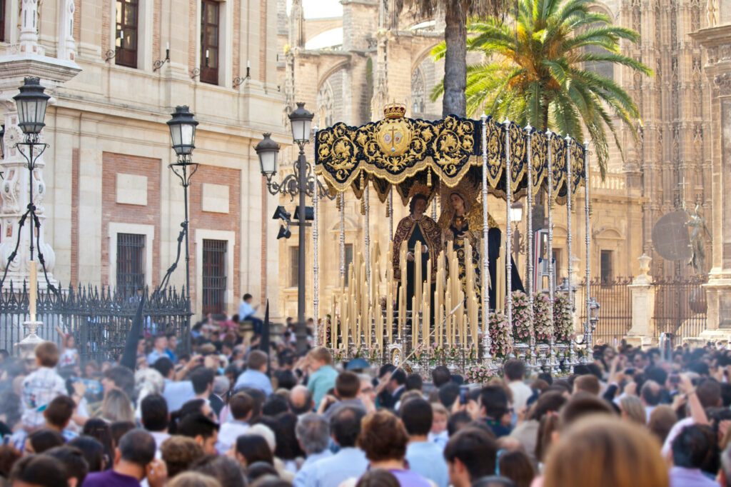 People tacking a virgin on Holy week in Seville, Andalusia, Spain.