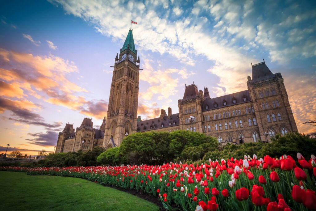 View of Canada Parliament building in Ottawa during tulip festival