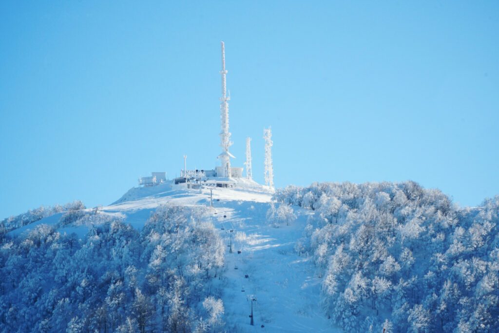 lift in the mountains. Kartepe mountain peak. Kartepe in Kocaeli Turkey. Base station on top of the mountain. Snowy mountain hill with base station.