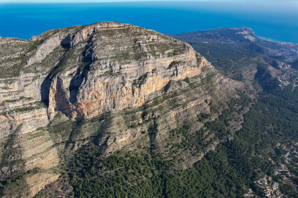 Aerial sunrise view of the Parque natural del Macizo del Montgó and the Montgó Massif