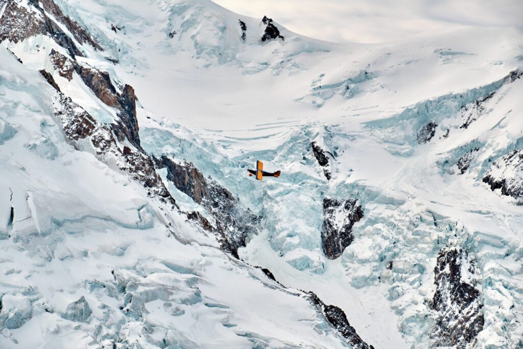 Small plane over the slope of Mont Blanc.