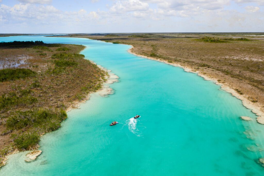 Kayaking along Los rapidos de Bacalar cenote in Mexico