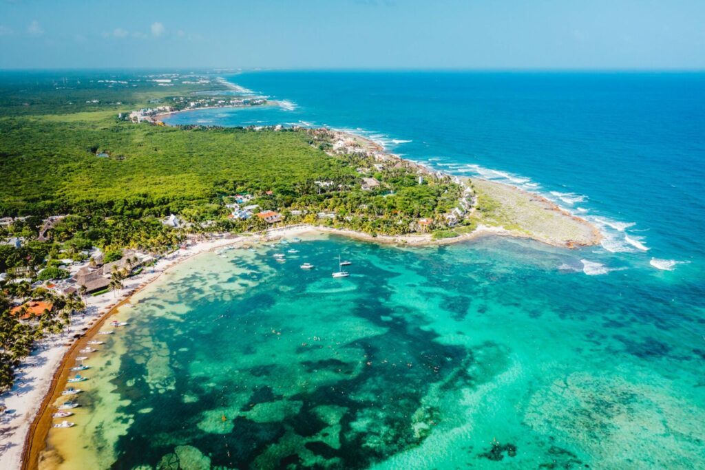 Aerial view of the Akumal Bay in Quintana Roo, Mexico. Caribbean Sea, coral reef, top view. Beautiful tropical paradise beach