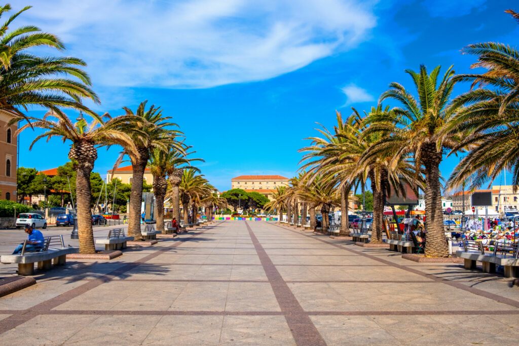 La Maddalena, Sardinia, Italy - Panoramic view of La Maddalena old town quarter with Piazza Umberto I square and park at Marina di Cala Mangravolpe port quarter