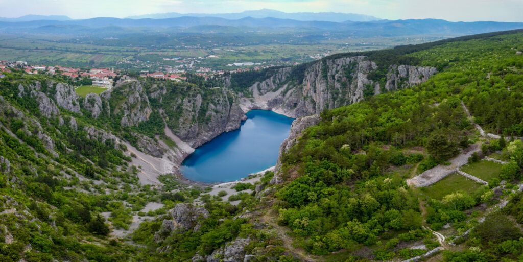 Blue Lake (Croatian: Modro jezero or Plavo jezero) is a karst lake located near Imotski in Croatia. It lies in a deep sinkhole possibly formed by the collapse of an enormous cave.