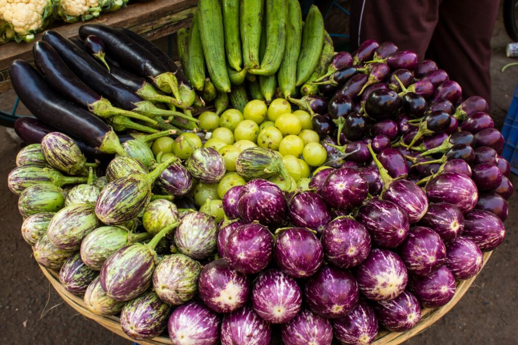 Fresh veggie basket from the Colaba Market farmer's market: onions, aubergines, scallions, shallots, lady's fingers