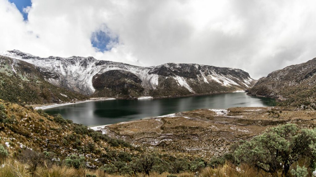 Images of green lake and we stop them in Los Andes. Lagoon located in the natural national park Los Nevados in Manizales Caldas Colombia.
