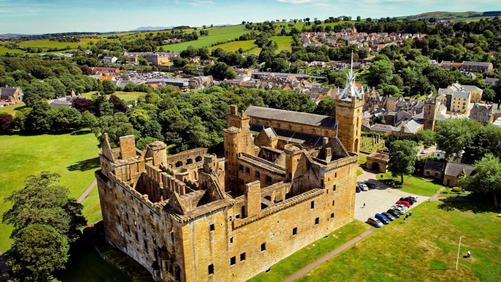 Aerial view of Linlithgow Abbey and the ruins of Linlithgow Palace.