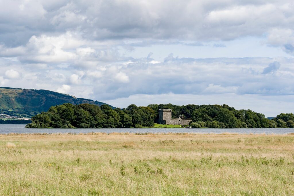 Landscape of Loch Leven, small island with Lochleven Castle near Kinross