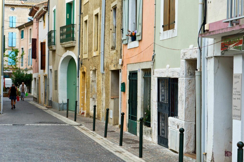 Buildings with window shutters, Serignan, Herault, Languedoc Roussillon, France