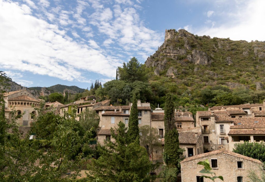 view of Saint-Guilhem-le-Désert medieval town in southern France